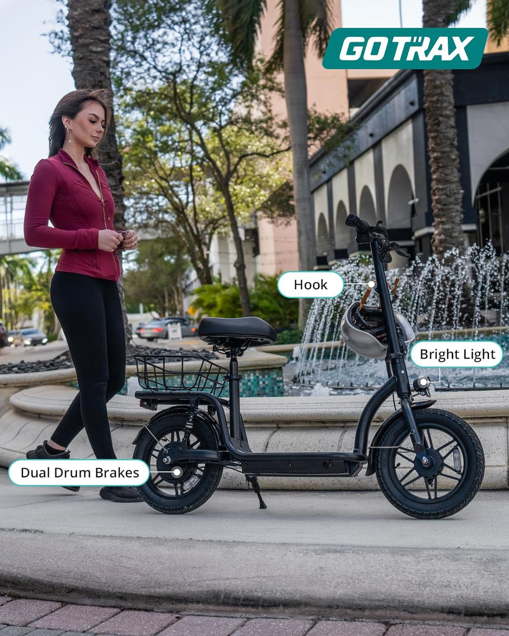 Gotrax adult electric scooter with seat maximum range of 19-25 miles all-terrain tires wide pedals