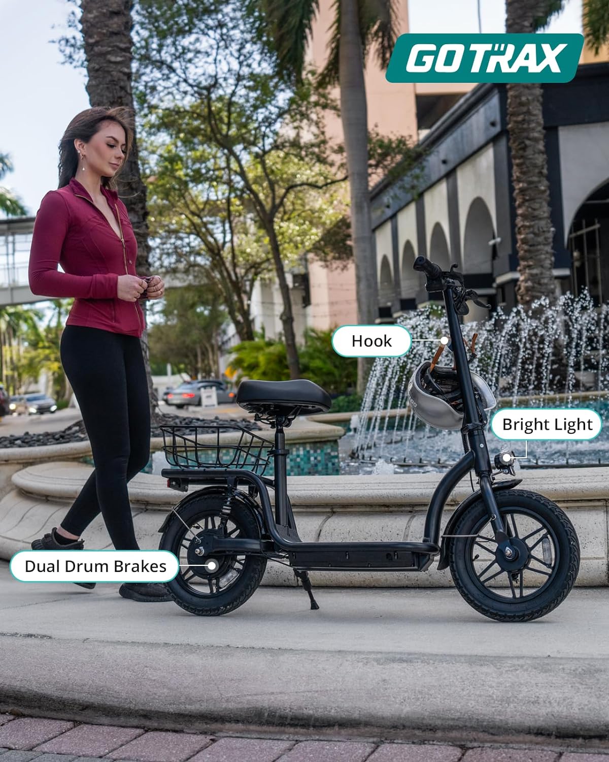 Gotrax adult electric scooter with seat maximum range of 19-25 miles all-terrain tires wide pedals
